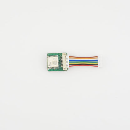 Small electronic module with multicolored wires on a white background labelled L76K HELTEC T114 GPS