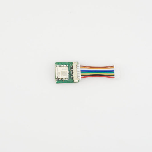 Small electronic module with multicolored wires on a white background labelled L76K HELTEC T114 GPS