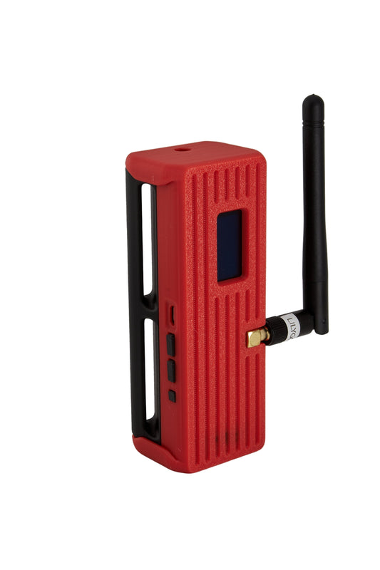 Red device with a black antenna on a gray background